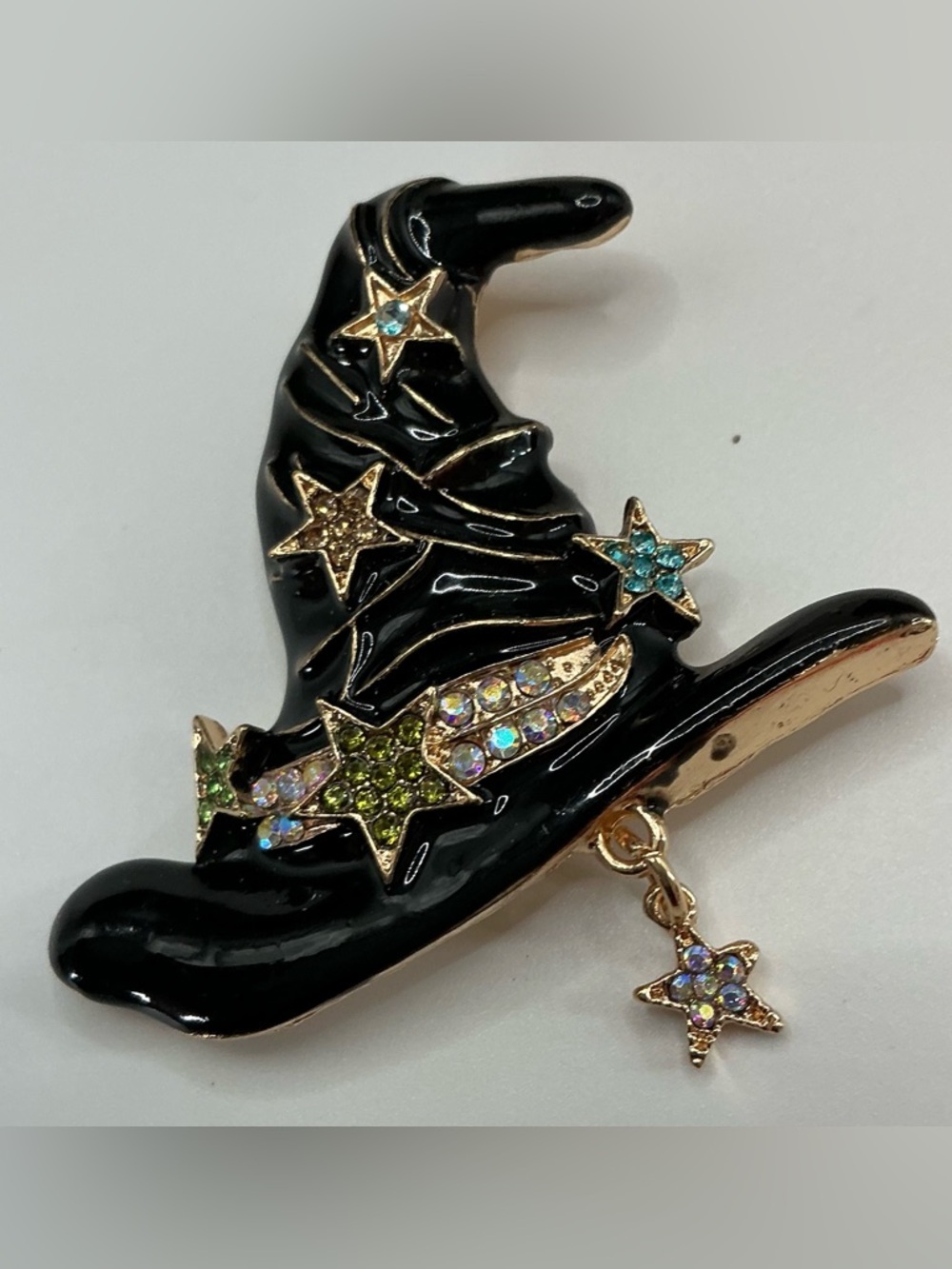 BLACK WITCH HAT GOLDTONE ACCENT AND DANGLING STAR CHARM RHINESTONE BROOCH